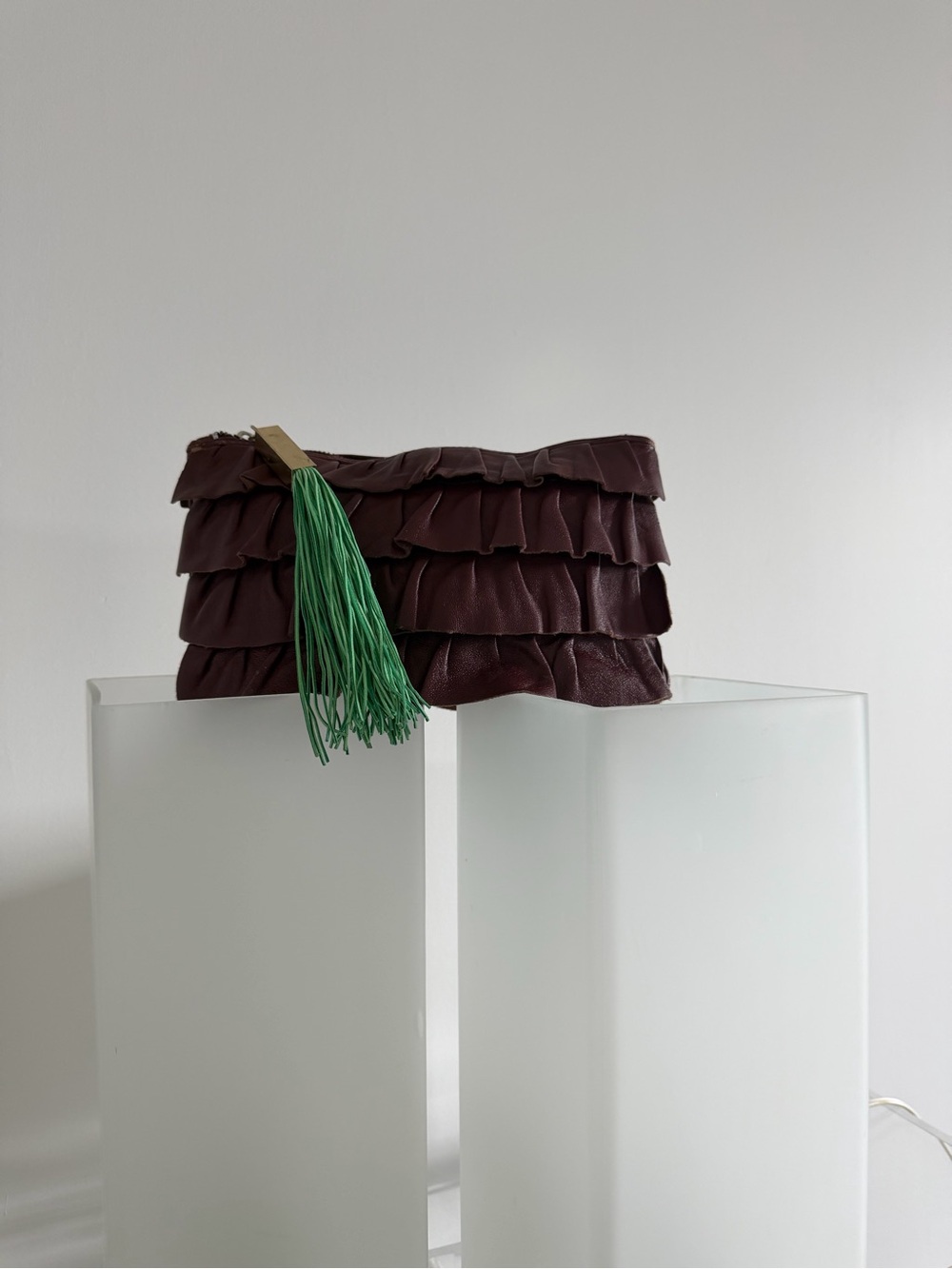 Ruffled Brown Leather Clutch with Green Tassel Accent